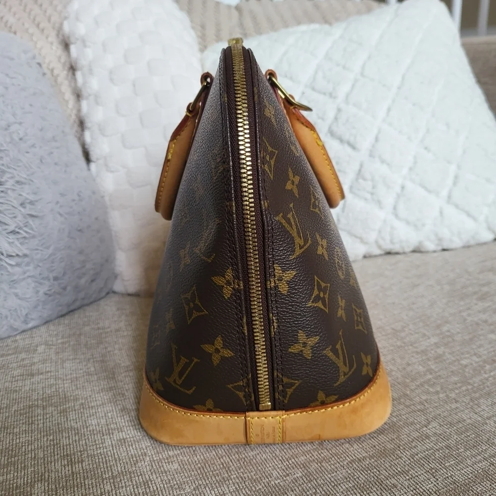 Authentic Louis Vuitton Monogram Alma PM Hand Bag..